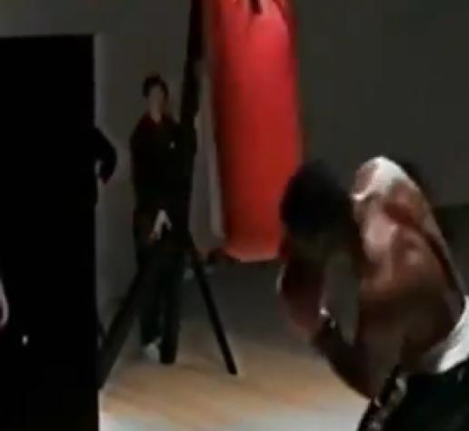 Mike Tyson working the heavy bag