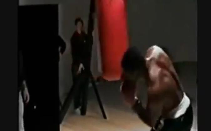 Mike Tyson working the heavy bag